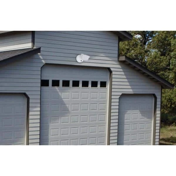 White Outdoor Integrated LED Dusk to Dawn Flood Light by LUTEC 4 White Outdoor Integrated LED Dusk to Dawn Flood Light by LUTEC - Image 2